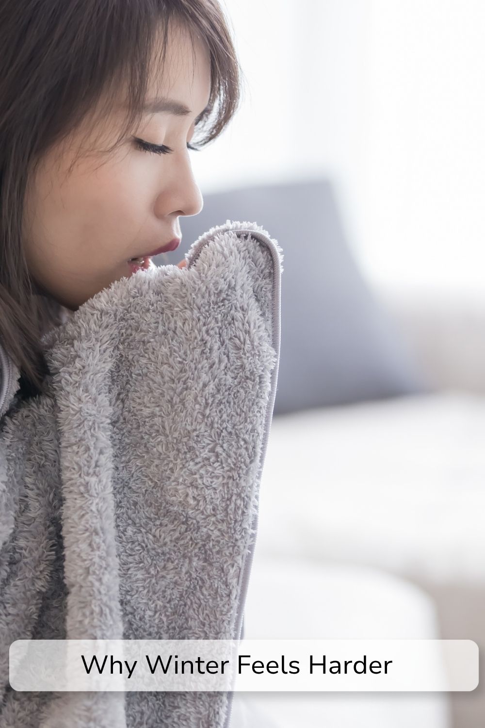 woman wrapped in a blanket with text over lay