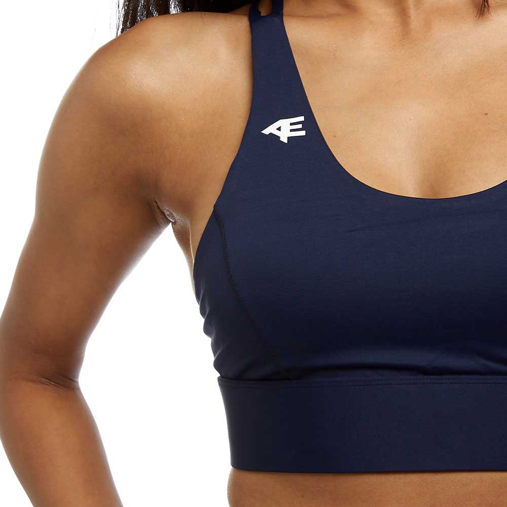 A close-up of the front of a sports bra, displaying the detailed fit and Active Elite logo.